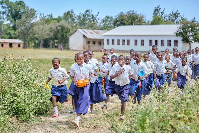 Students at Idugumbi Primary School, Mbeya, Tanzania, take their lunch break.