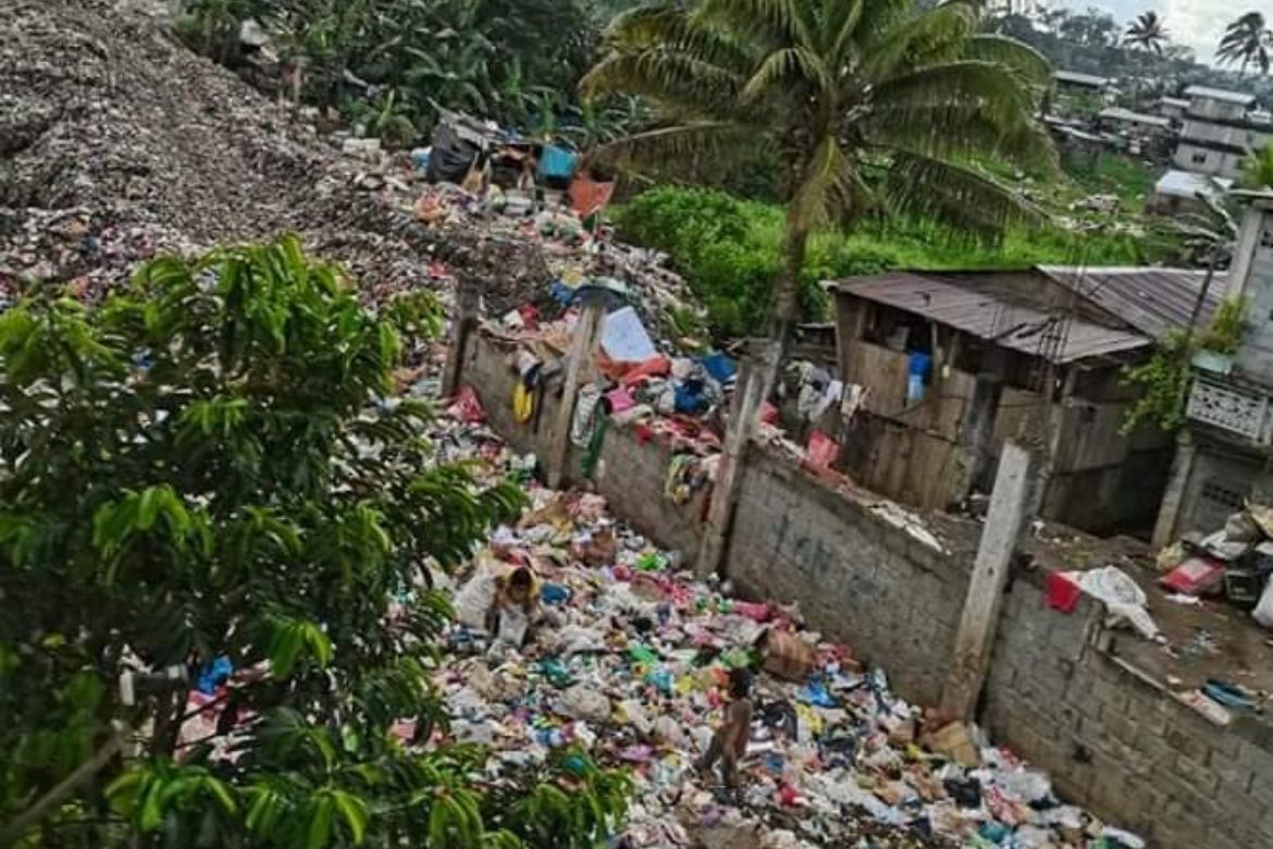 The view before the RPMD dumpsite was relocated. A Multiply-Ed volunteer. 