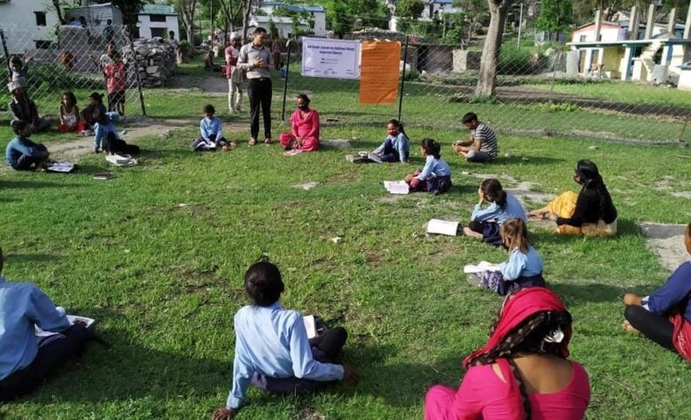 Budhinanda Basic School of Kolti, Bajura organized outdoor teaching with parents/guardians present to ensure continued learning