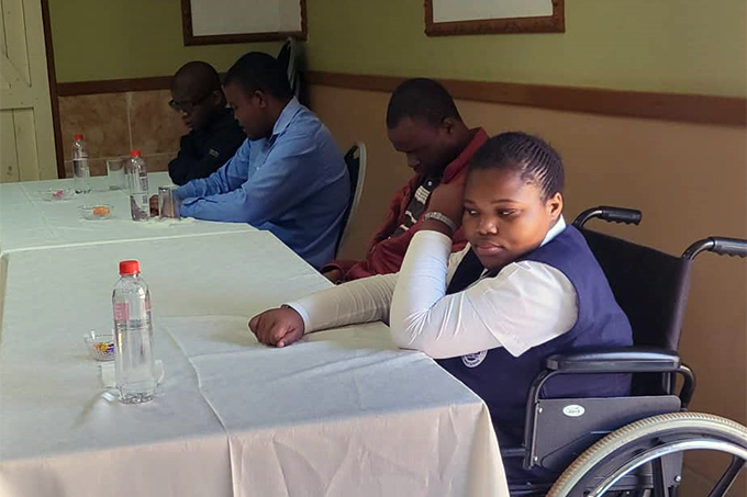 Members of Eswatini's local education group during a meeting.