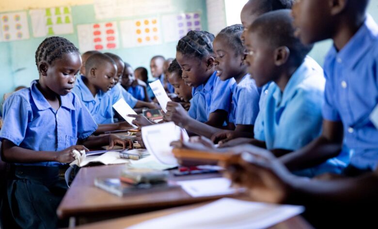 Students at Bethel Primary School in Katete District learn literacy skills during the "Catch Up Program" at school