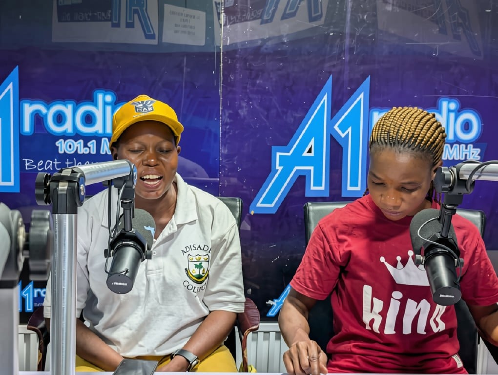 Two young women in a radio studio