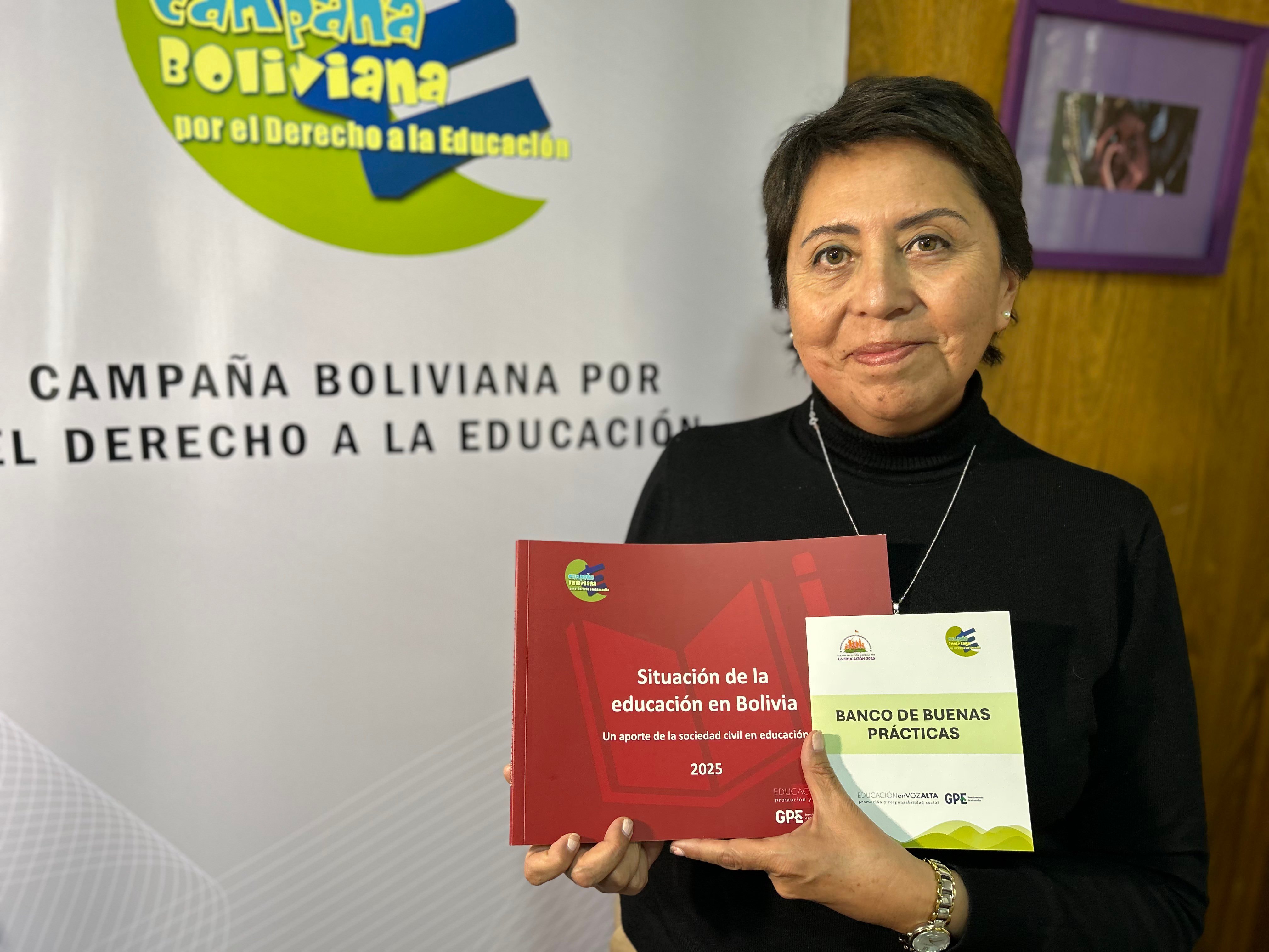 Adult woman holding publications