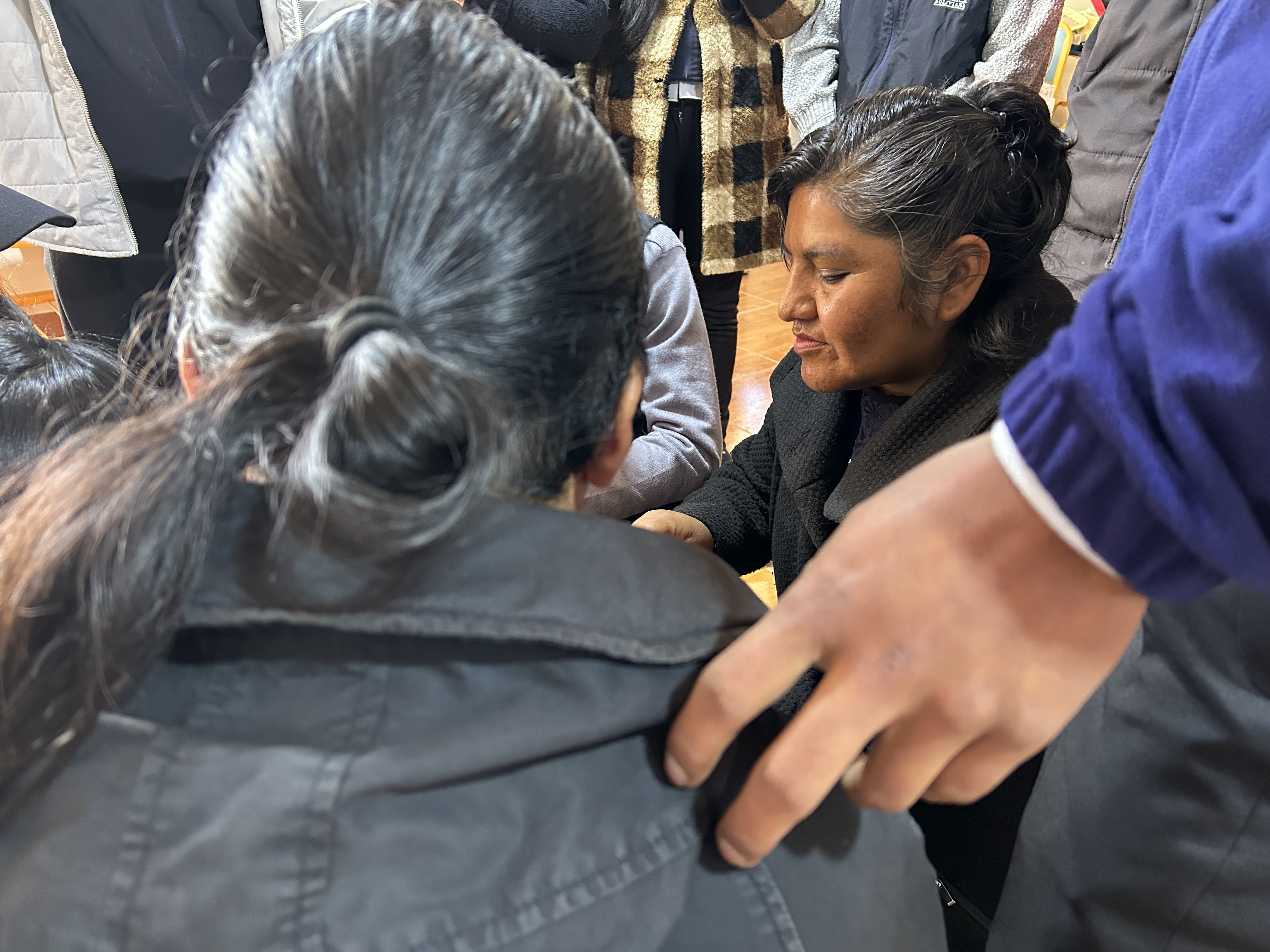 Students and teacher in a circle